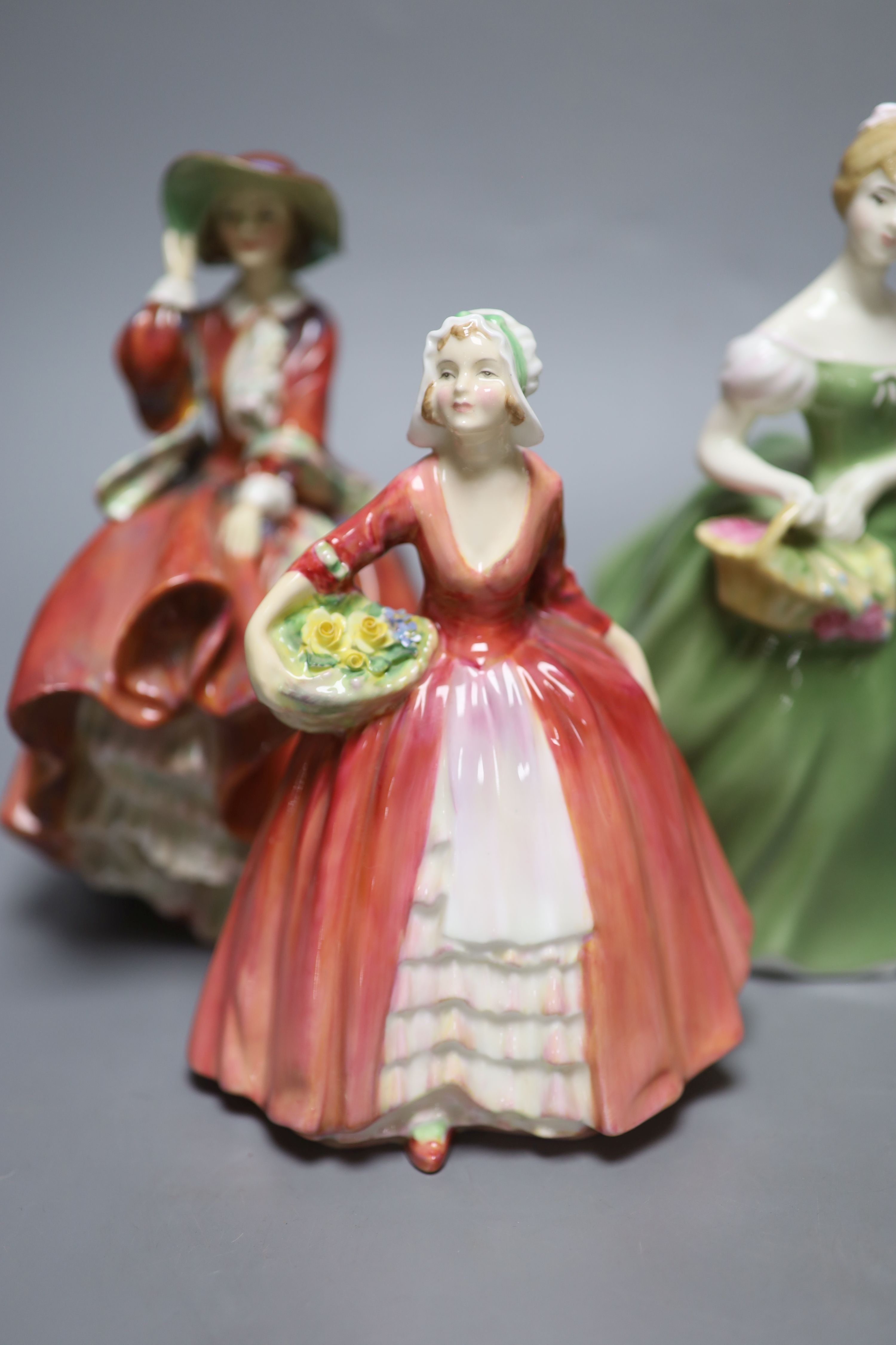 A collection of six Royal Doulton figures; The Paisley Shawl HN1392, Top o the hill HN1834, Clarissa HN2345, Stayed at home HN2207, Ja